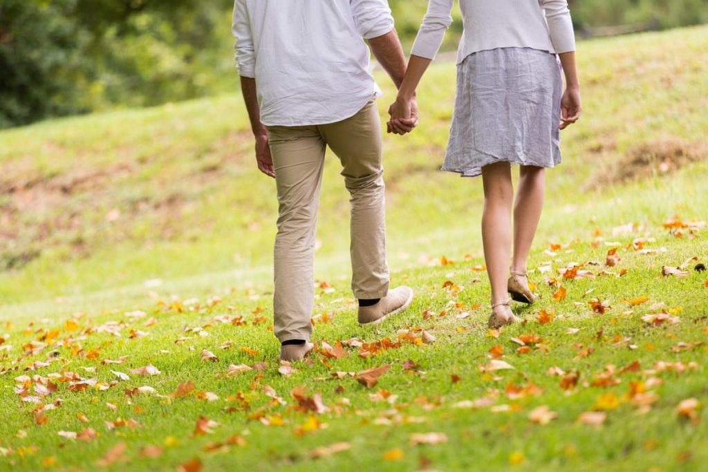 Couple holding hands