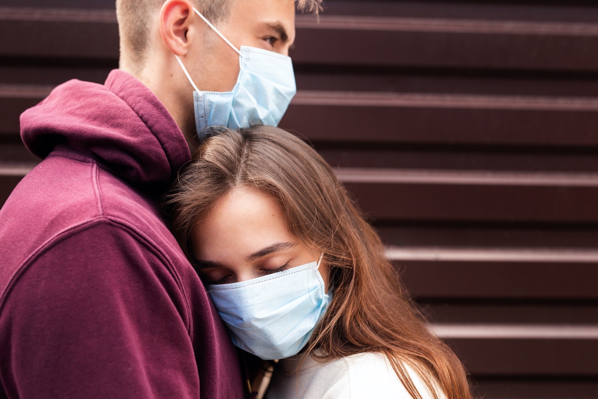 A younger couple worried about covid-19